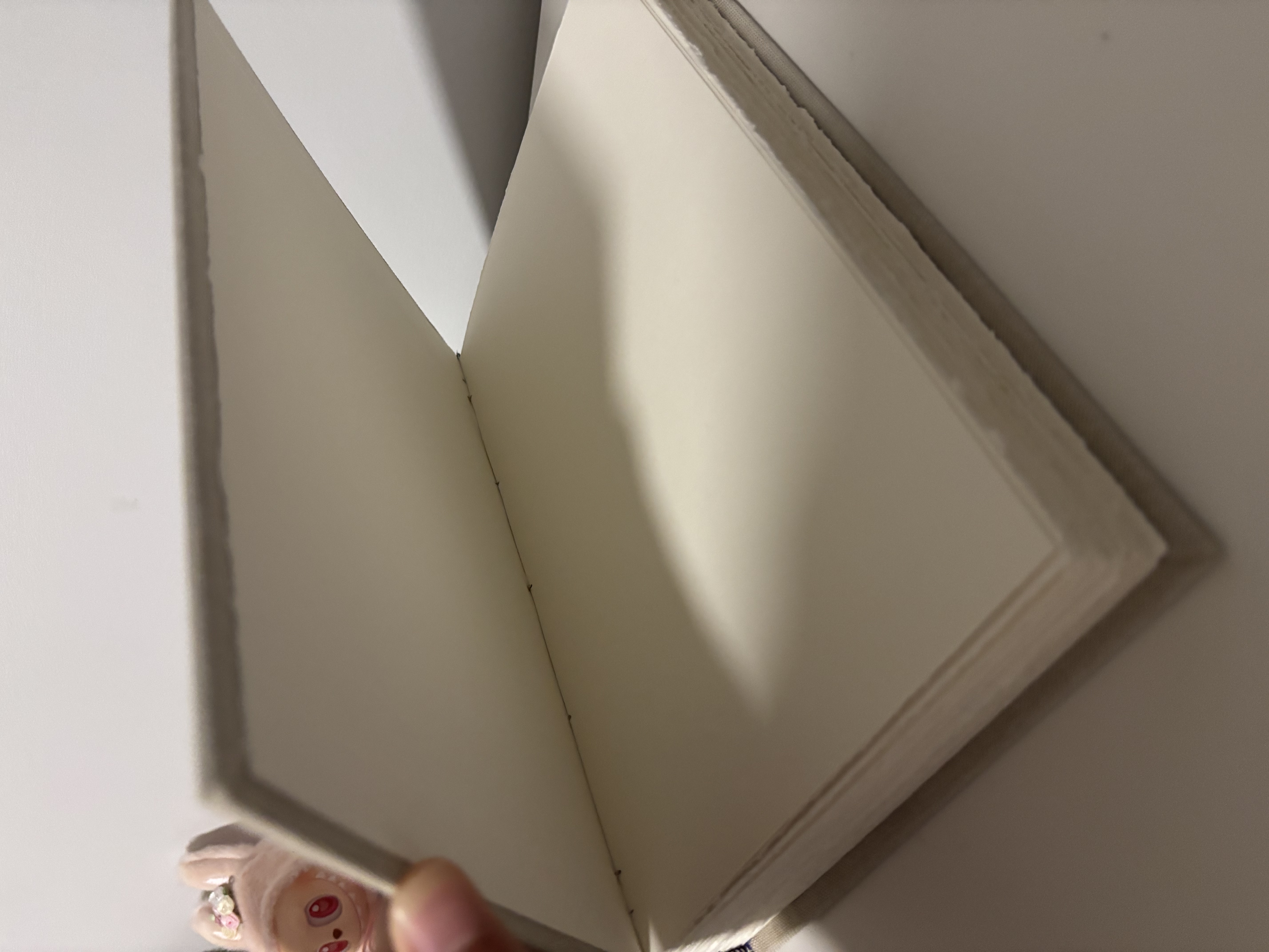 Object-interaction with a book. Light bulb turns on when the book is closed.